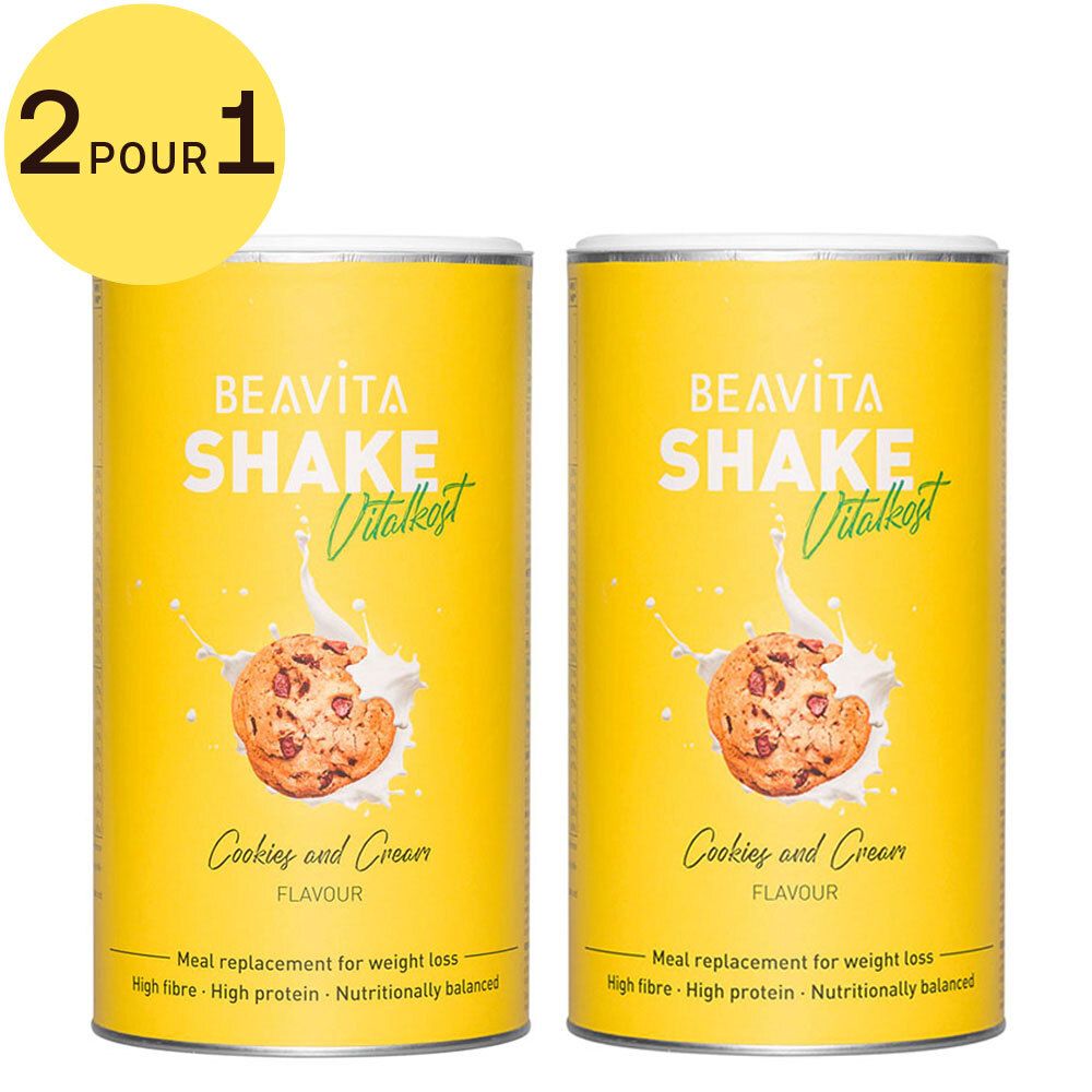 Deux boîtes jaunes Beavita Shake Vitalkost, Cookies and Cream. Inscription: 2 pour 1. Avec image de cookie.
