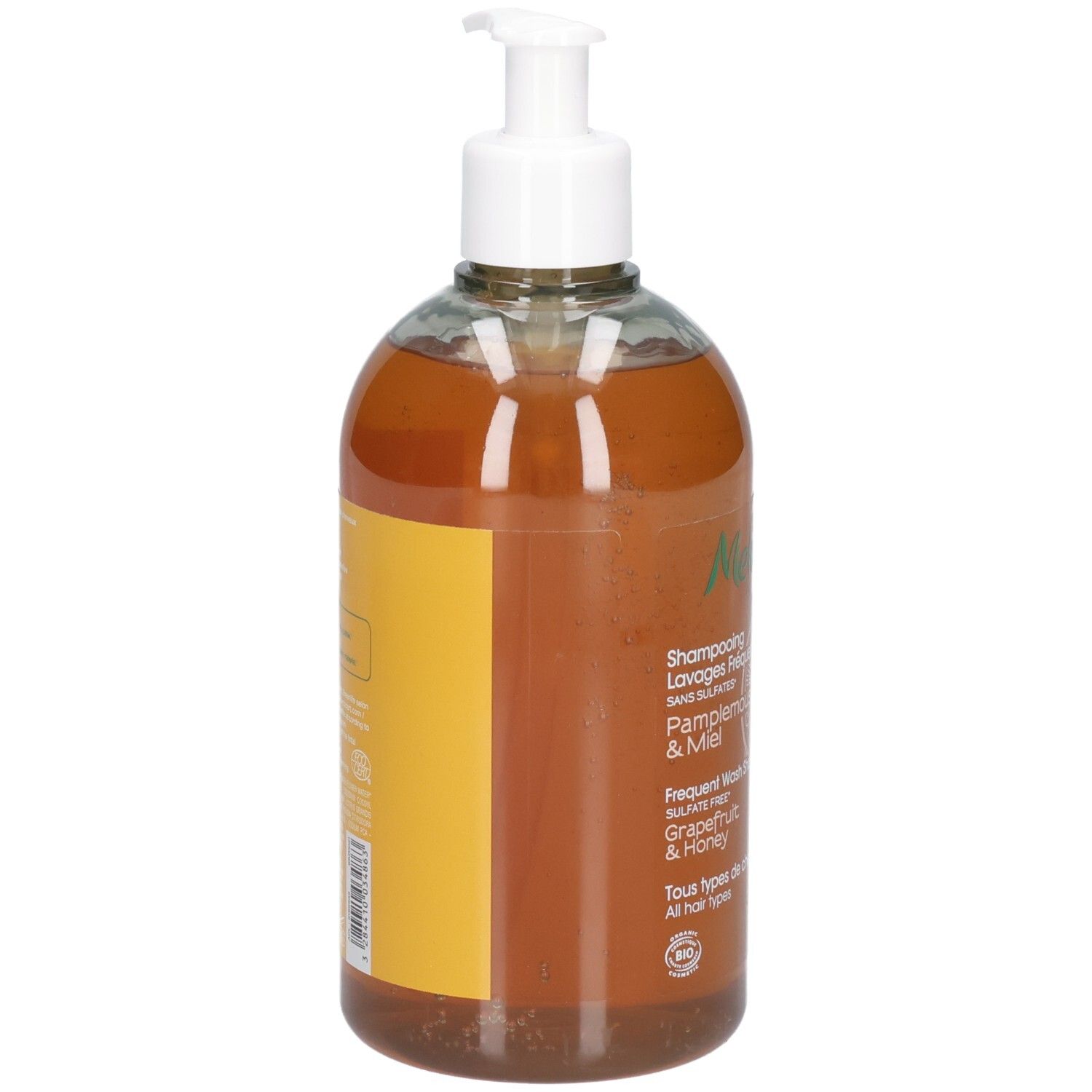 Braune Flüssigkeit in durchsichtiger Flasche mit weißem Pumpspender. Gelbes Etikett mit Produktinformationen.