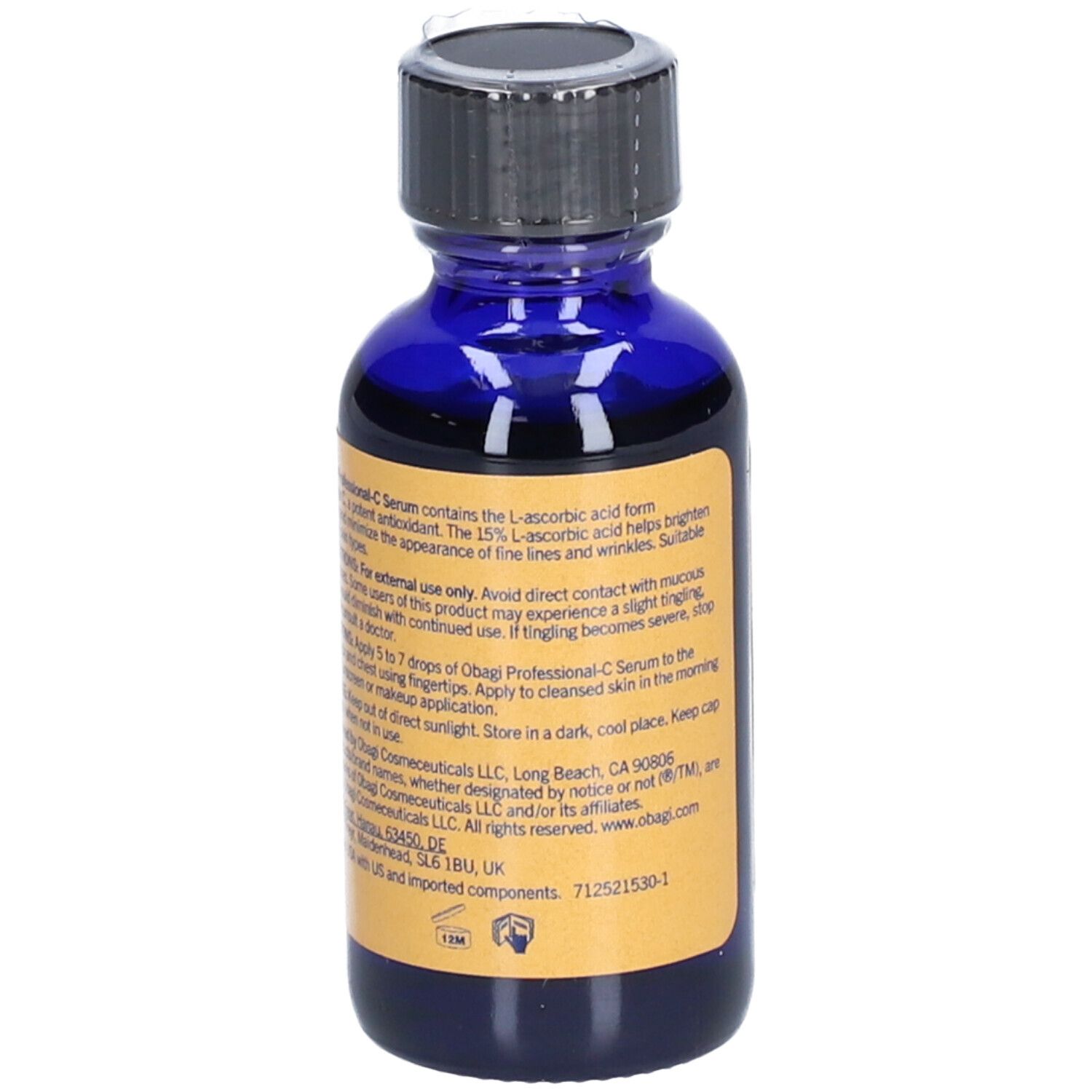 Blaue Glasflasche mit schwarzem Deckel. Etikett mit Produktinformationen. Text in Englisch. 1 fl. oz. (30 ml).