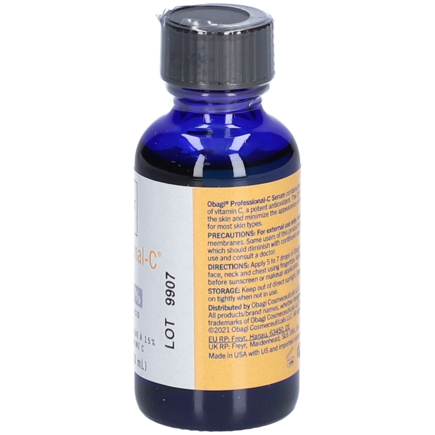 Blaue Glasflasche mit schwarzem Deckel. Etikett mit Produktinformationen. Text in Englisch. 1 fl. oz. (30 ml).