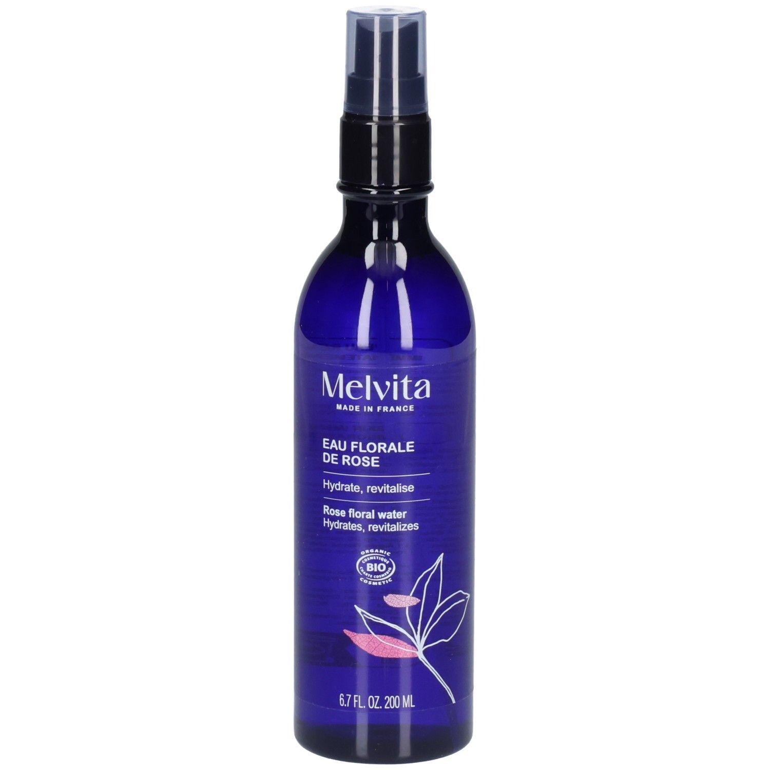 Melvita Eau Florale de Rose, blaue Sprühflasche mit Etikett, leicht schräg.