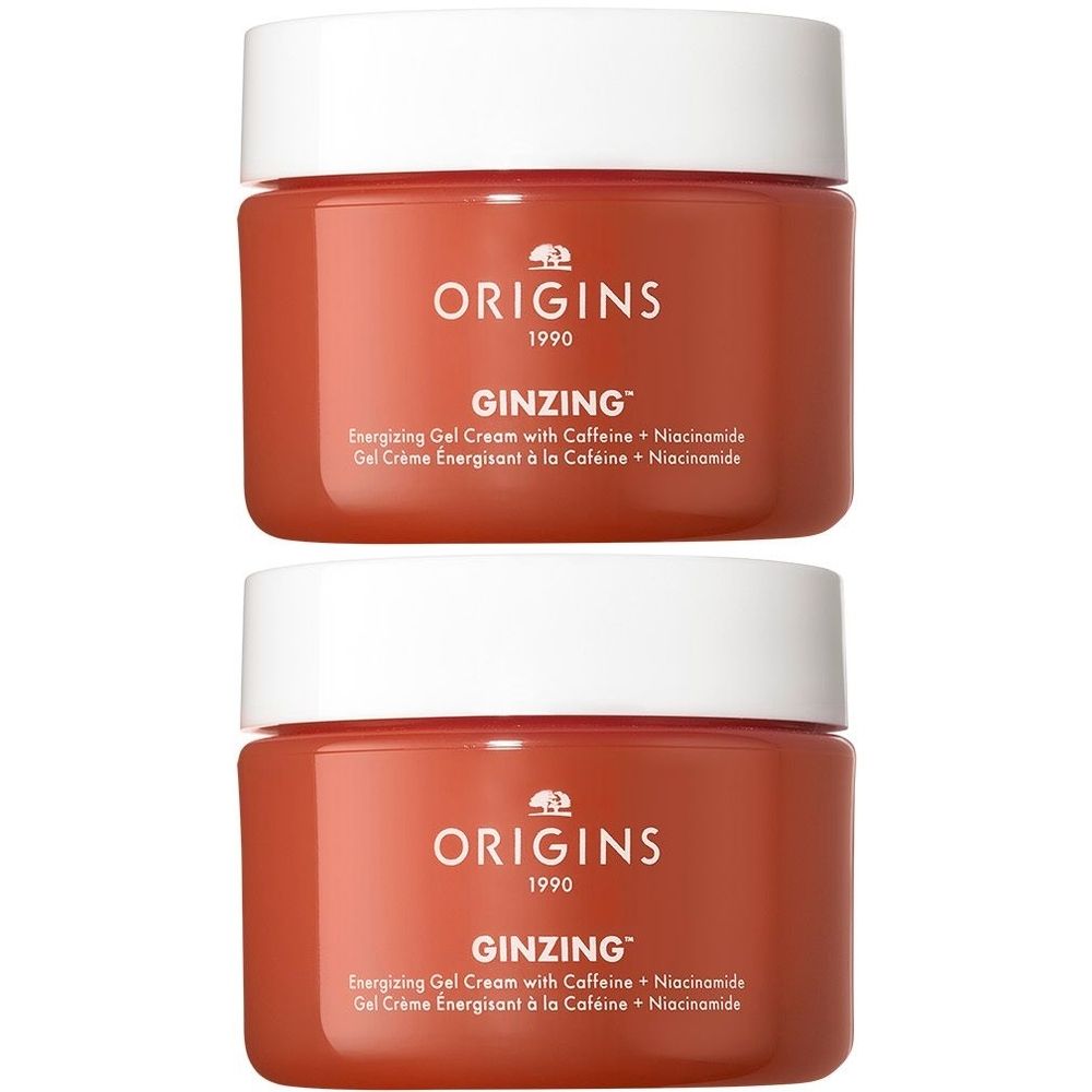 Zwei ORIGINS GinZing™ Energizing Gel Cream-Tiegel. Rote Tiegel mit weißem Deckel. Text: ORIGINS, GINZING™, Energizing Gel Cream.