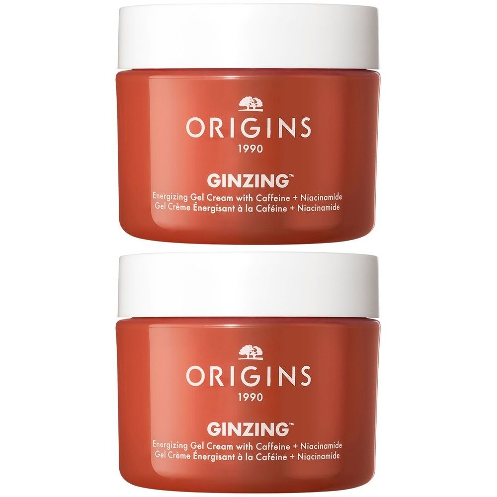 Zwei Tiegel ORIGINS GinZing™ Energizing Gel Cream. Roter Behälter mit weißem Deckel. Produktname und Details auf dem Etikett.