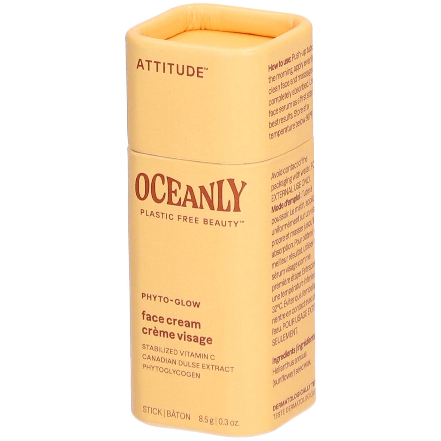 Emballage cylindrique jaune. ATTITUDE, OCEANLY, Phyto-Glow, crème visage. En bas: STICK, 85g/0.3 oz. Texte en anglais et français.