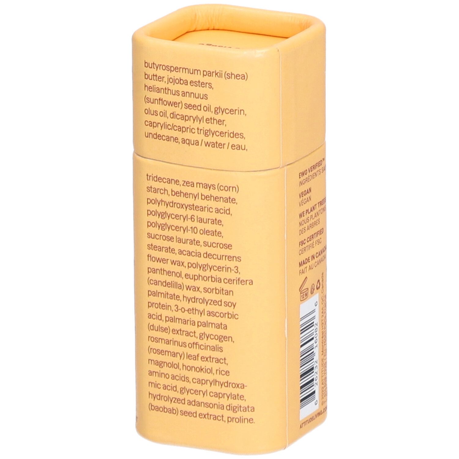 Emballage cylindrique jaune. Liste des ingrédients. Texte: BUTYROSPERMUM PARKII, BUTTER, JOJOBA ESTERS, HELIANTHUS ANNUUS.