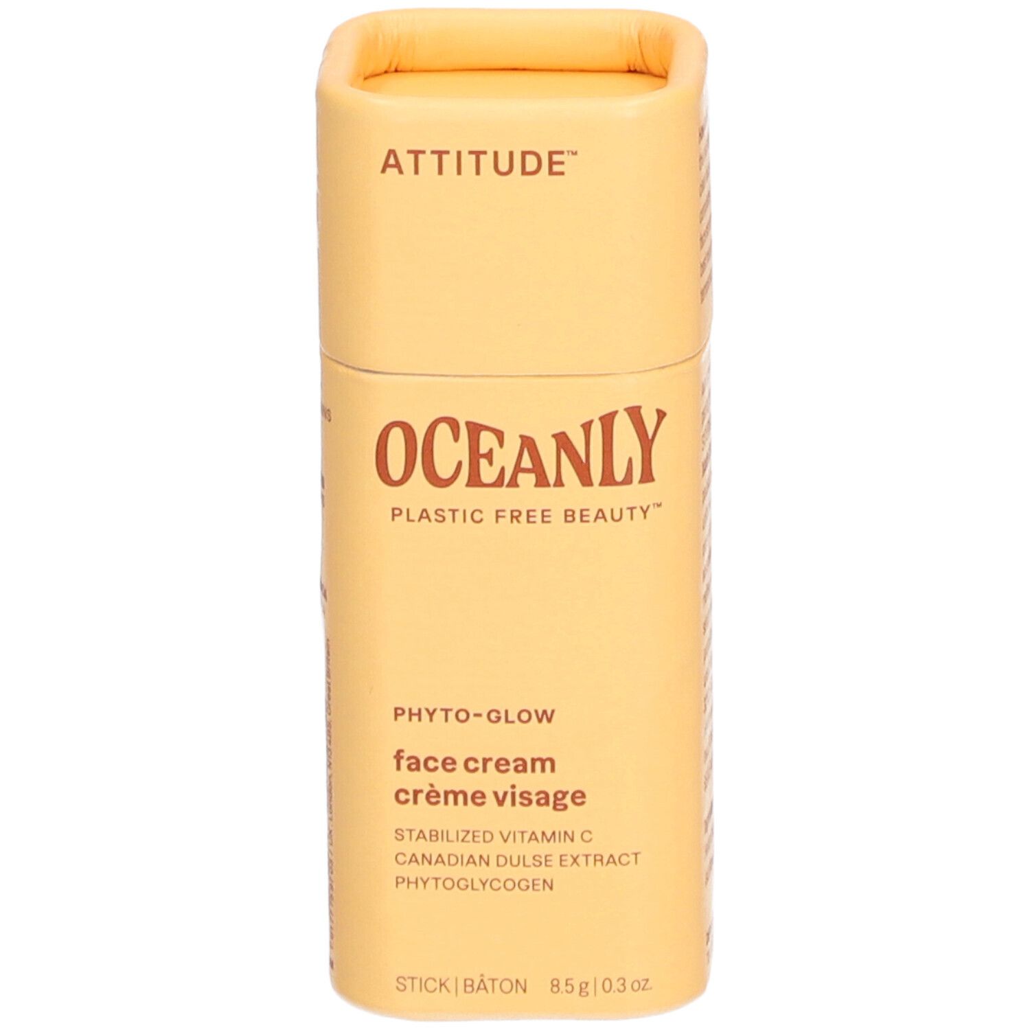 Emballage cylindrique jaune. ATTITUDE, OCEANLY, Phyto-Glow, crème visage. En bas: STICK, 85g/0.3 oz.