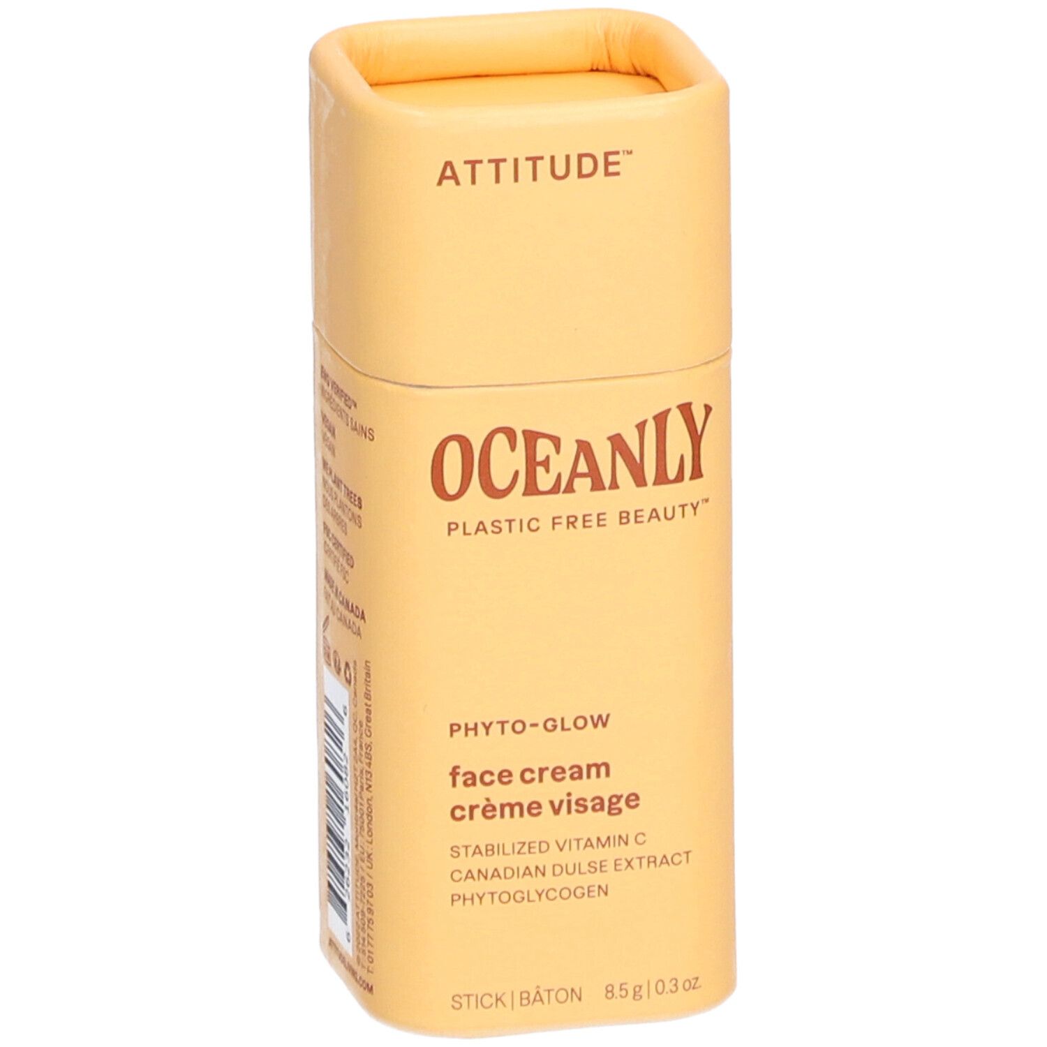 Emballage cylindrique jaune. ATTITUDE, OCEANLY, Phyto-Glow, crème visage. En bas: STICK, 85g/0.3 oz.
