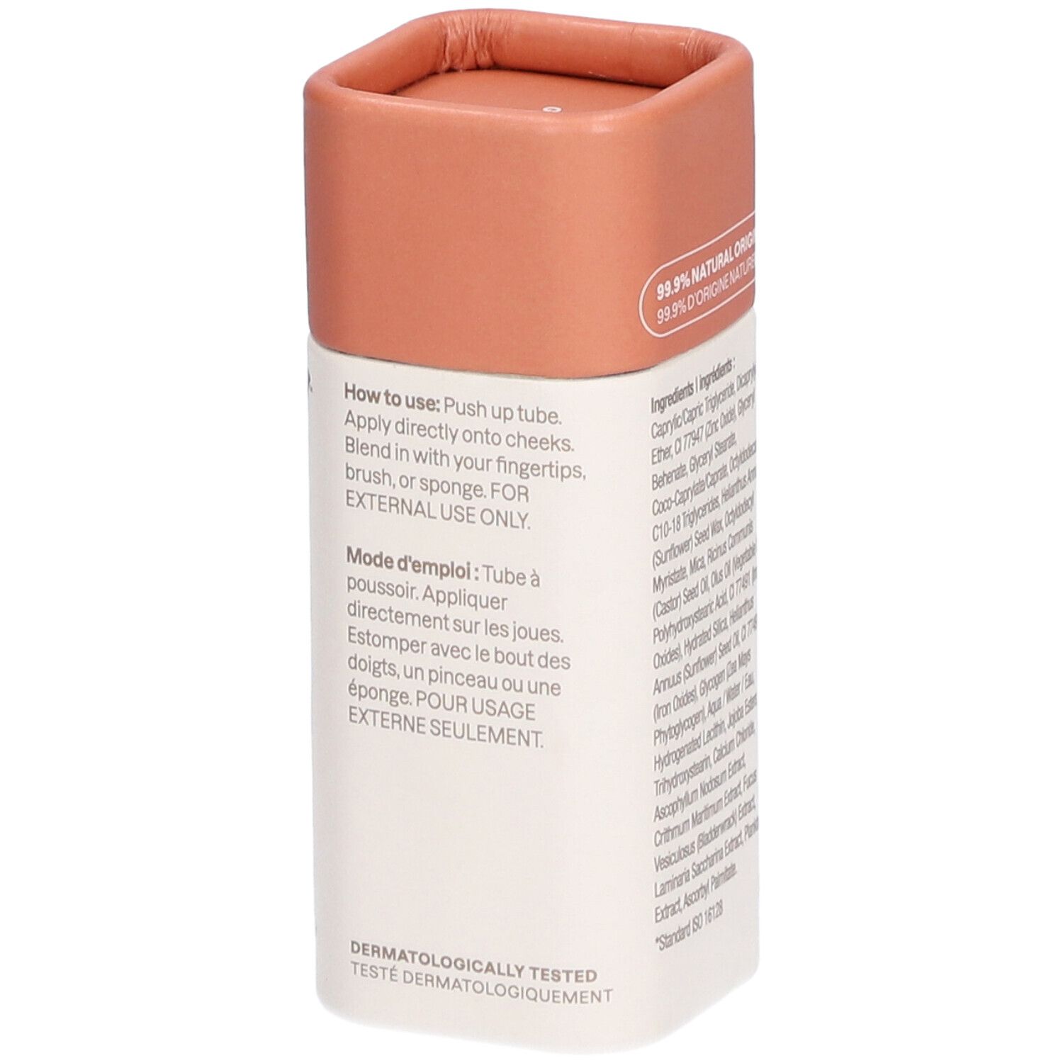 Stick avec couvercle rose. Inscription: OCEANLY, Ginger, cheeks blush. Mode d'emploi sur le côté.