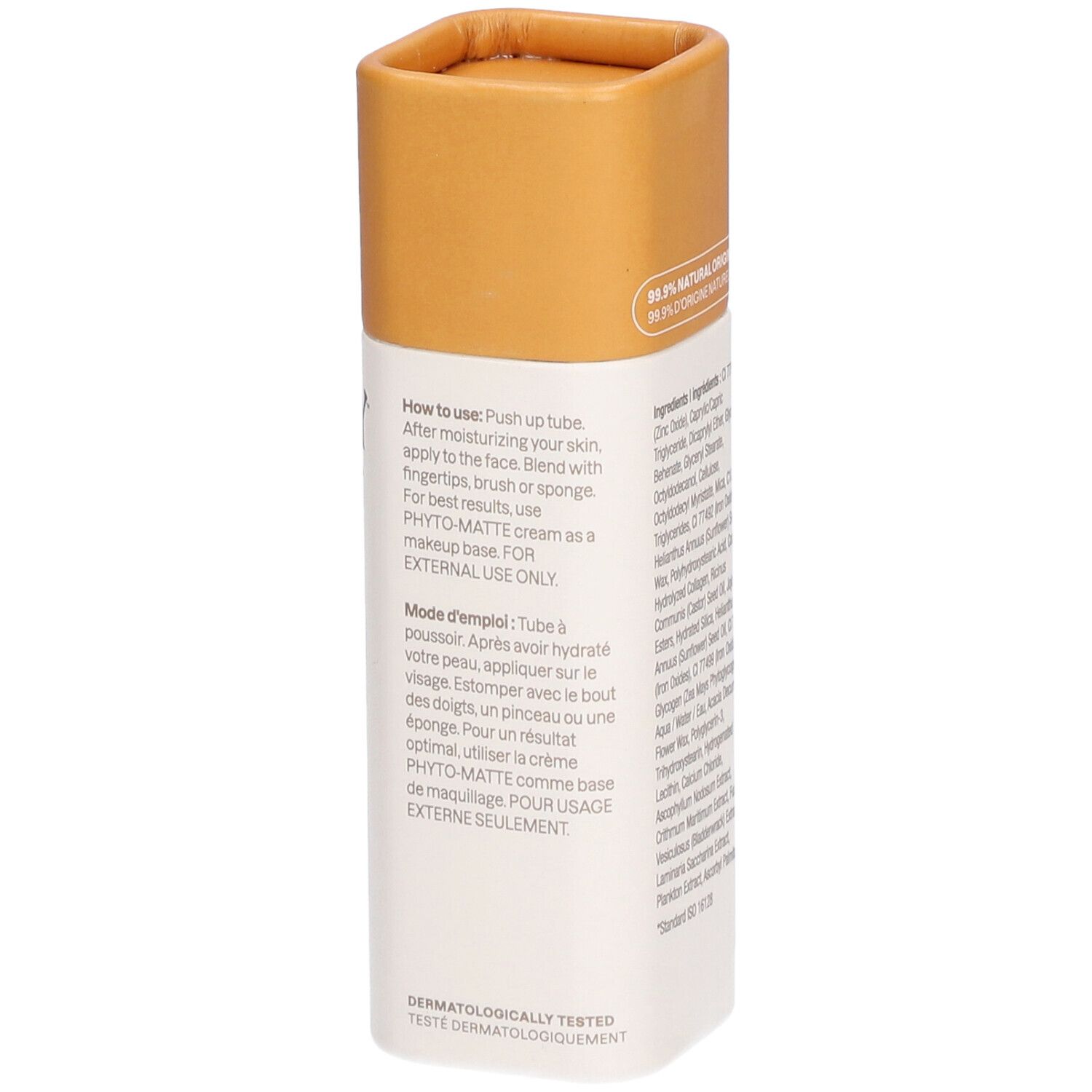 Bâton de fond de teint. Arrière avec instructions d'utilisation. En anglais et français. Testé dermatologiquement.