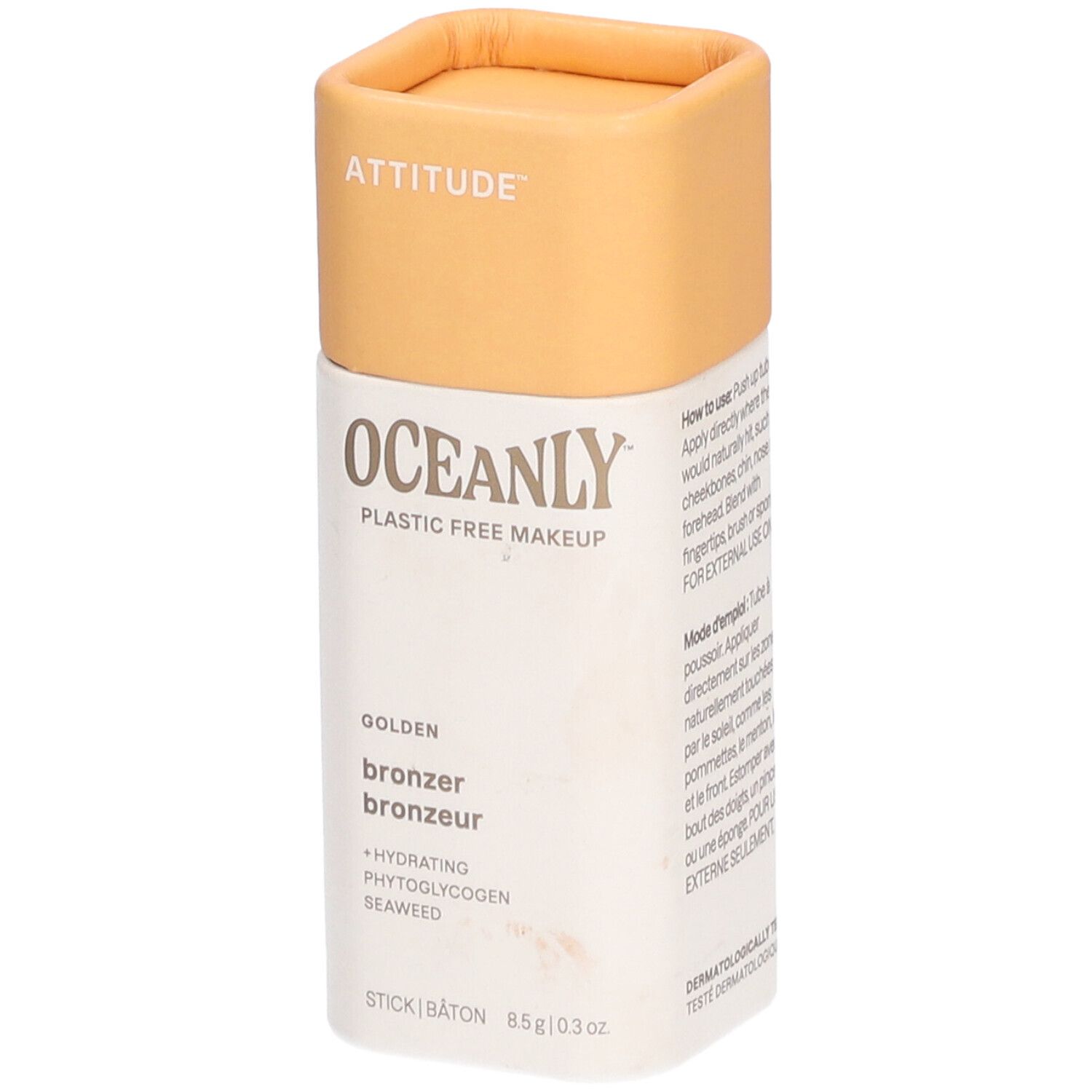 Cilindervormige houder met deksel. Opschrift: ATTITUDE, OCEANLY, bronzer, 8,5g/0,3oz. Gouden tint.