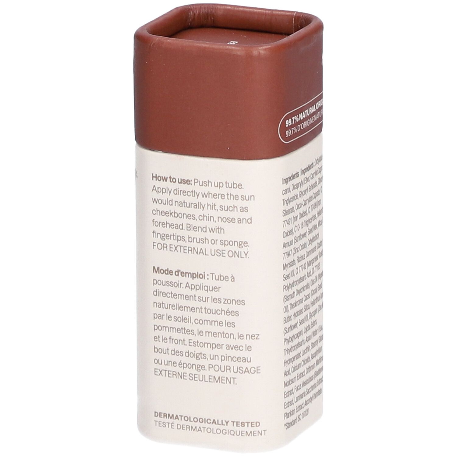 Bronzer-stick met bruin deksel. Tekst: How to use, Mode d'emploi. Dermatologisch getest. Merk: ATTITUDE, OCEANLY.