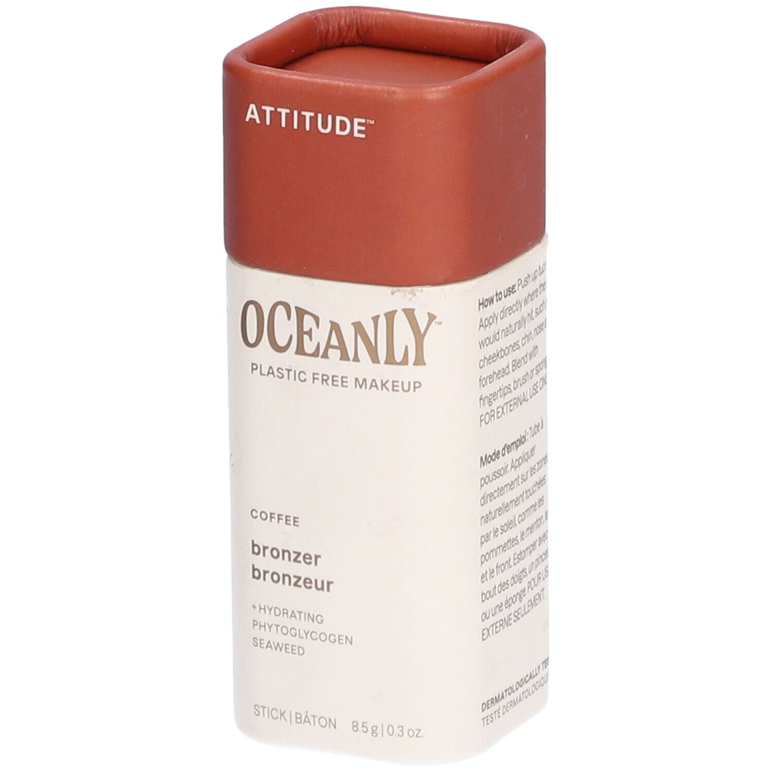 Stick bronzer cylindrique avec couvercle marron. Inscriptions : ATTITUDE, OCEANLY, bronzer, café. 8,5g.