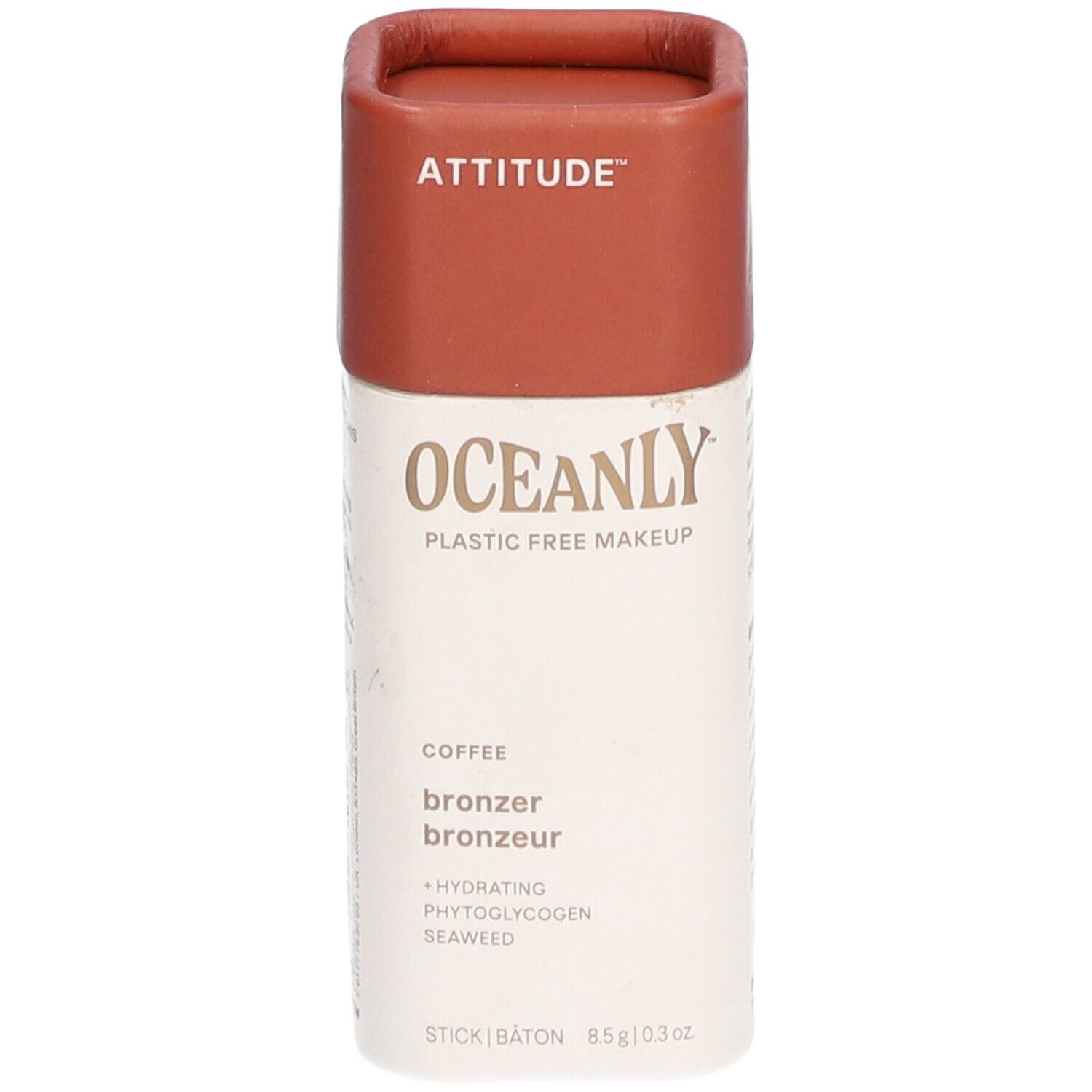 Stick bronzer cylindrique avec couvercle marron. Inscriptions : ATTITUDE, OCEANLY, bronzer, café. 8,5g.