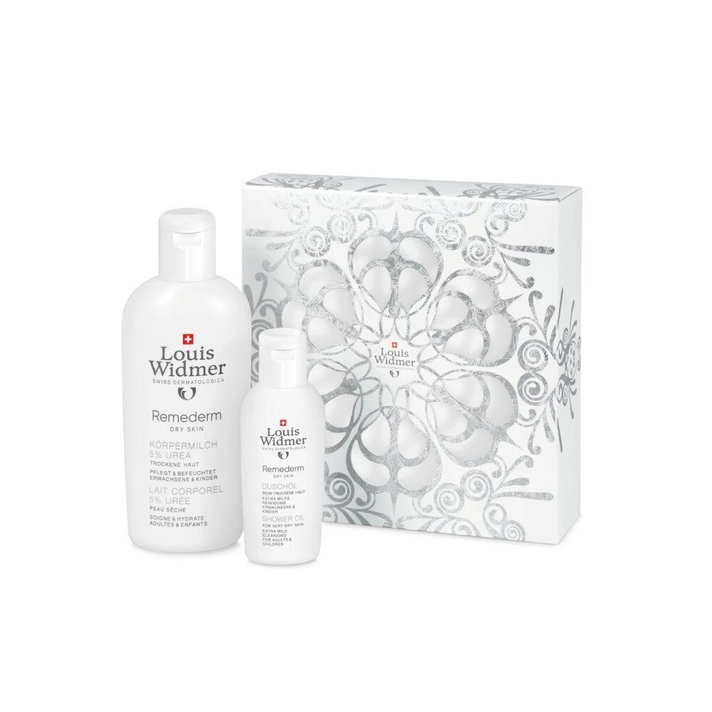 Coffret cadeau avec deux flacons et une boîte. Logo Louis Widmer visible. Produits sur fond blanc.