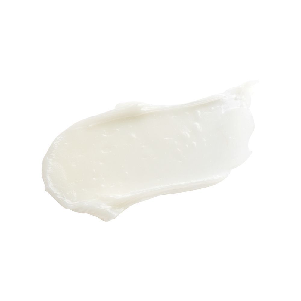 Produit blanc, texture crémeuse. Sur fond clair.