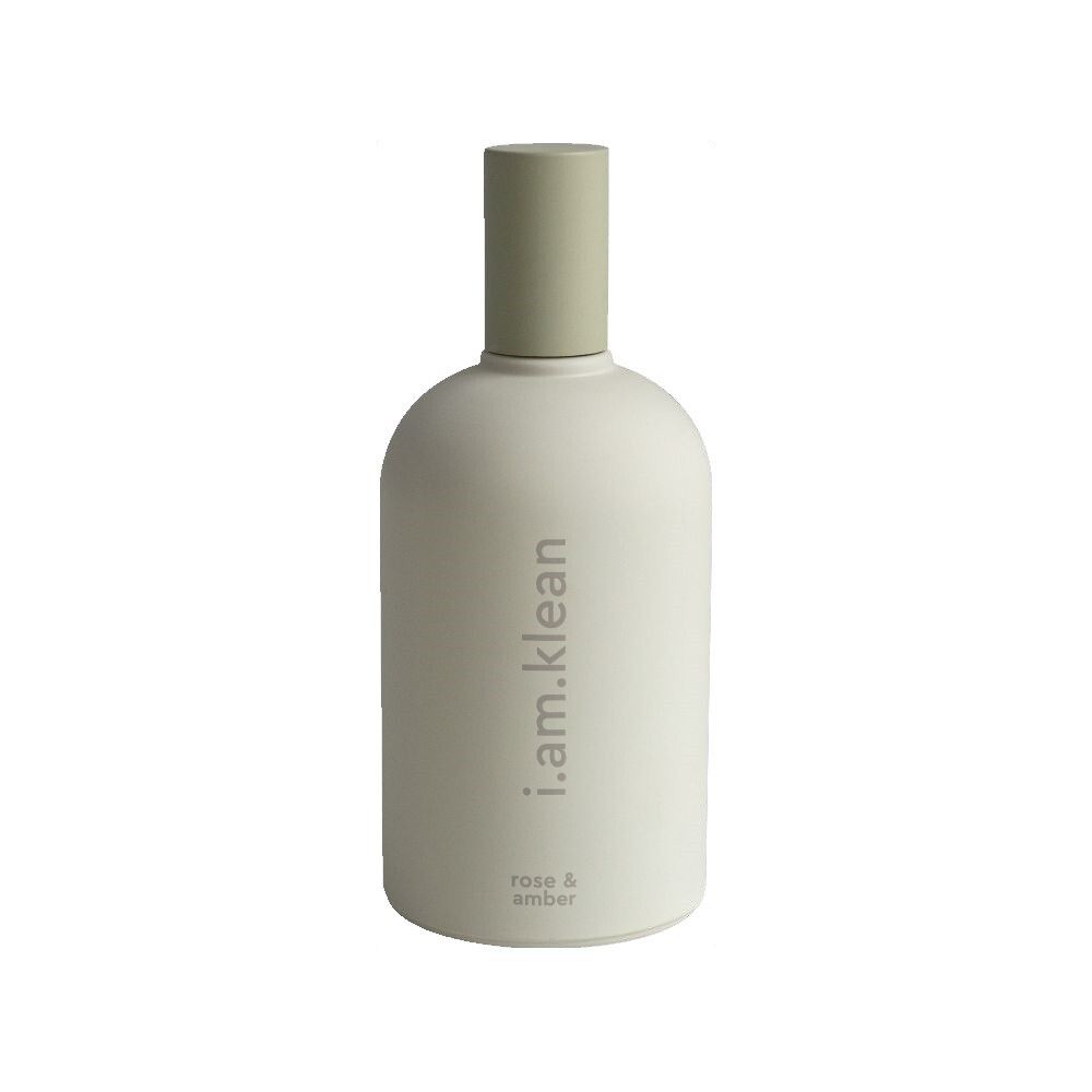 Beige Flasche mit grünem Verschluss. Aufschrift: i.am.klean, rose & amber.
