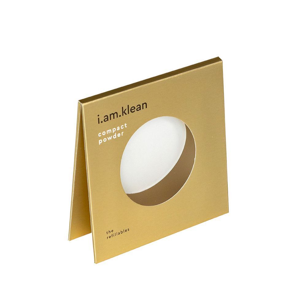 Goldfarbene Verpackung mit rundem Sichtfenster. i.am.klean und compact powder Schriftzug.
