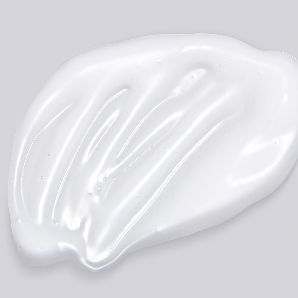 Gel blanc sur fond gris. Texture lisse.