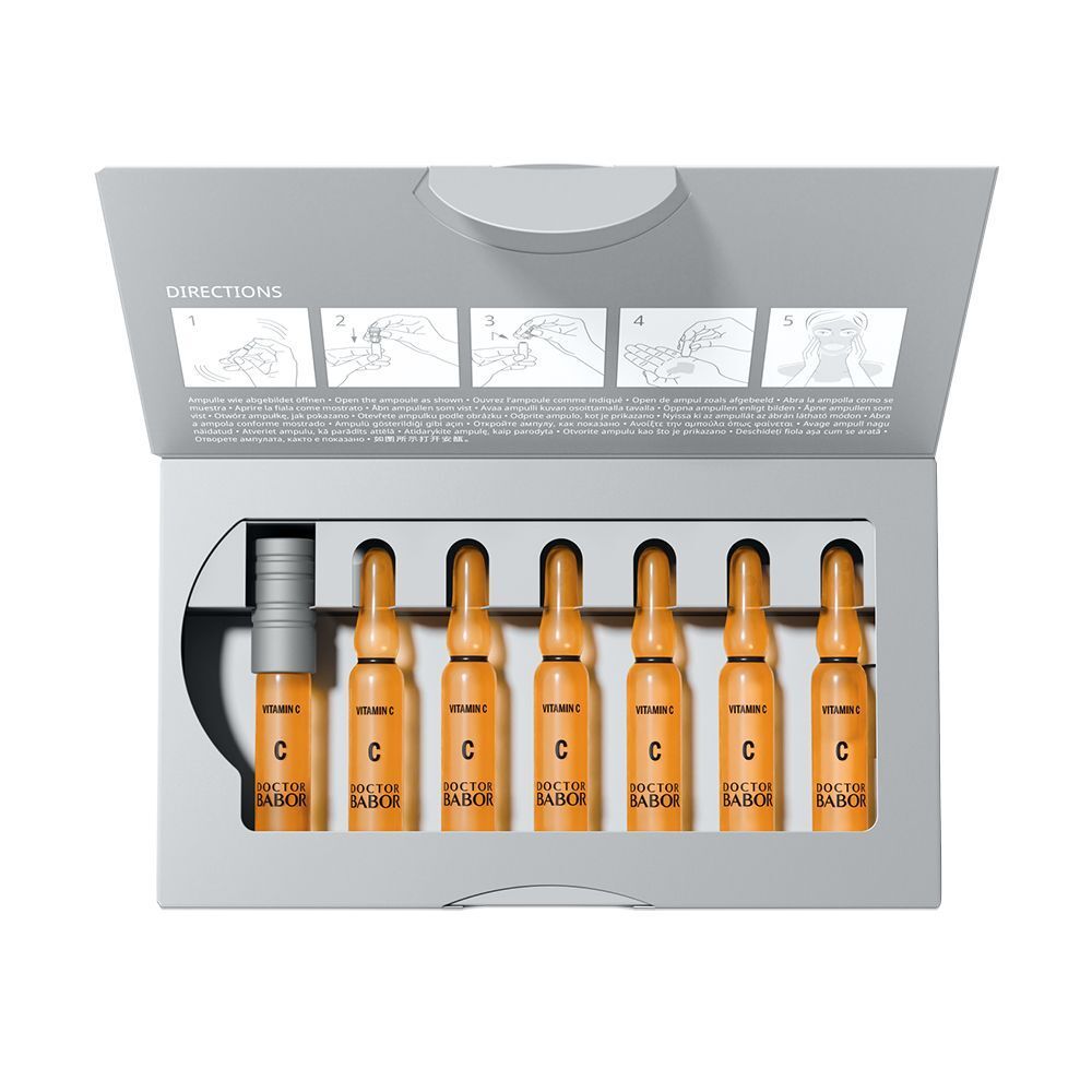 Geöffnete graue Schachtel mit 7 Ampullen und einem Applikator. Aufschrift: Vitamin C, Doctor BABOR.