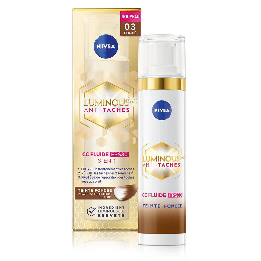 Produit avec emballage. Flacon et boîte. Inscription: Nivea, Luminous 630 Anti-Taches, CC Fluide FPS30, Teinte Foncée.