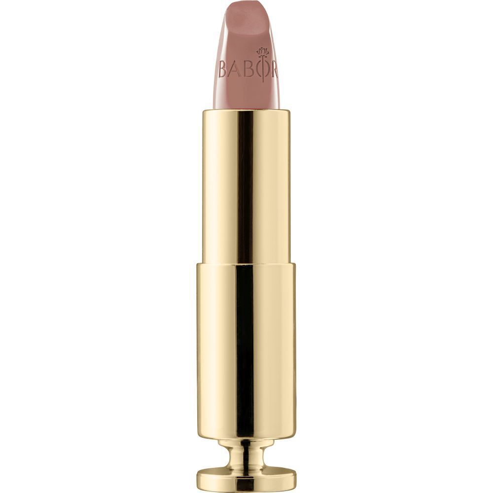 Goldfarbener Lippenstift mit beigefarbener Spitze. Marke Babor.