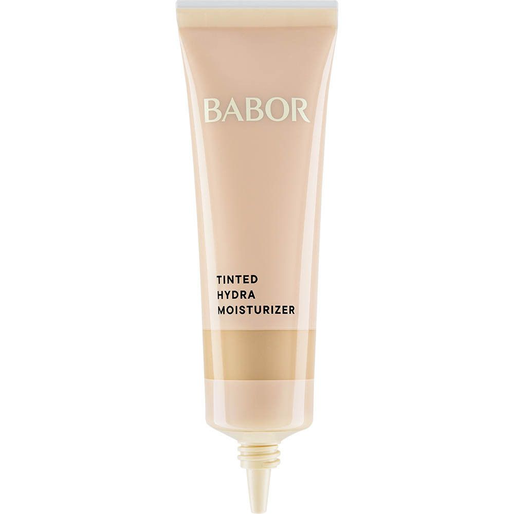 BABOR® Tinted Hydra Moisturizer Tube. Beige Tube mit schwarzem Pumpkopf. Text: TINTED HYDRA MOISTURIZER.