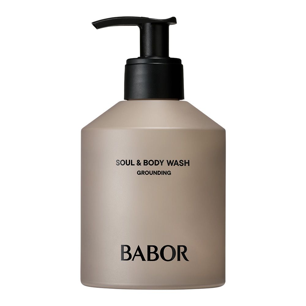 Flacon beige avec pompe noire. Inscription : Soul & Body Wash, Grounding, Babor.