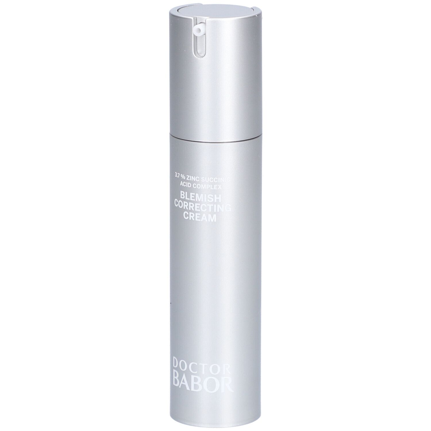 Silberne Flasche mit Aufschrift 'Blemish Correcting Cream' und 'Doctor Babor'.