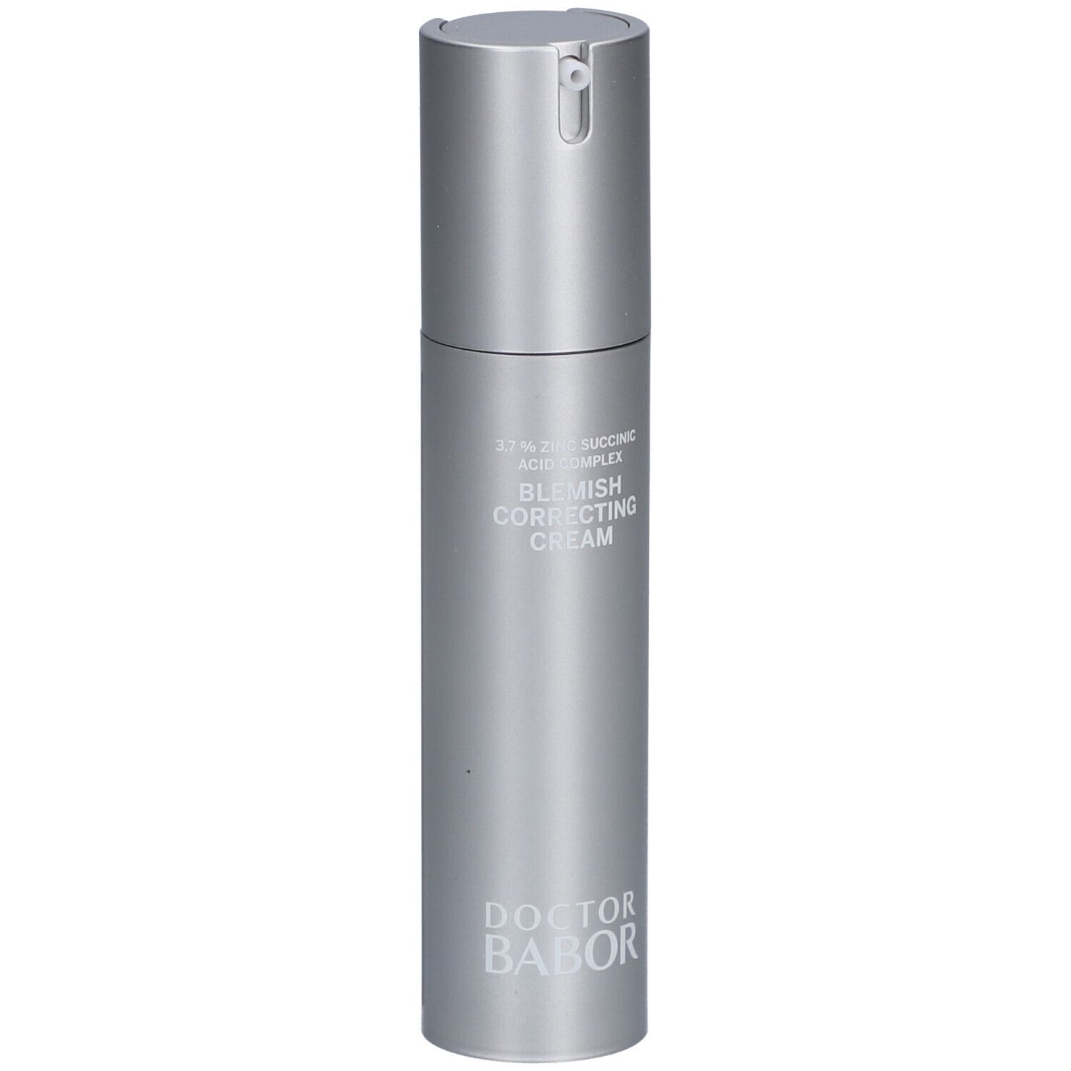 Silberne Flasche mit Aufschrift 'Blemish Correcting Cream' und 'Doctor Babor'.