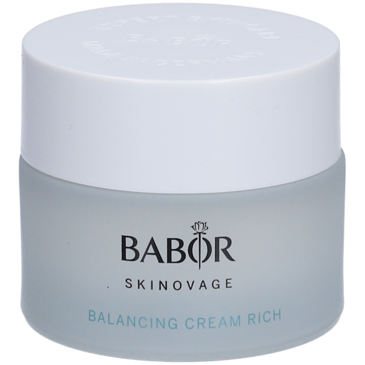 Creme-Tiegel mit weißem Deckel. Auf dem Tiegel steht BABOR SKINAVAGE. Darunter: BALANCING CREAM RICH.