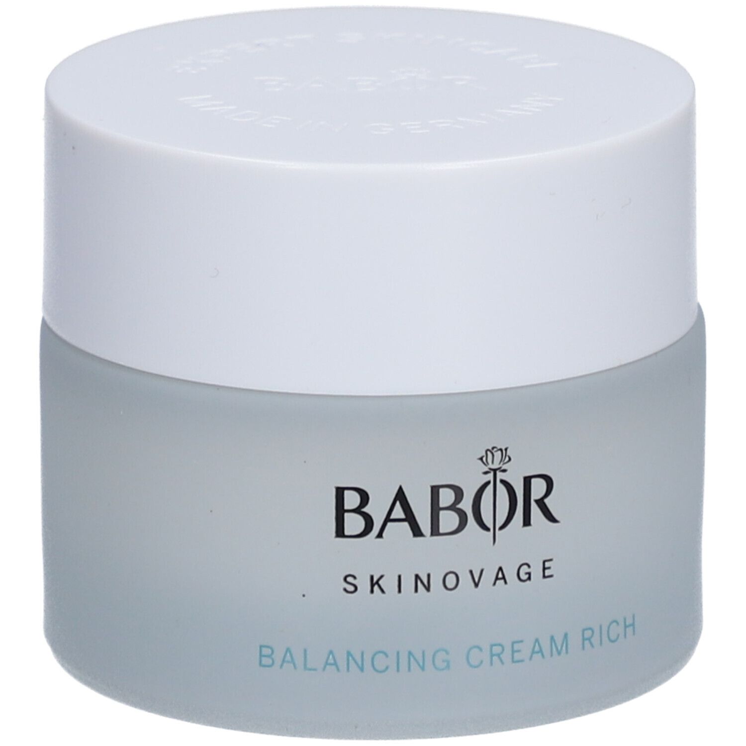 Creme-Tiegel mit weißem Deckel. Auf dem Tiegel steht BABOR SKINAVAGE. Darunter: BALANCING CREAM RICH.