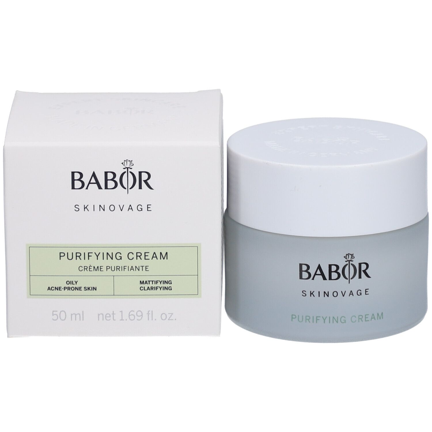 Creme und Verpackung. Auf der Verpackung steht BABOR SKINAVAGE PURIFYING CREAM. 50 ml.
