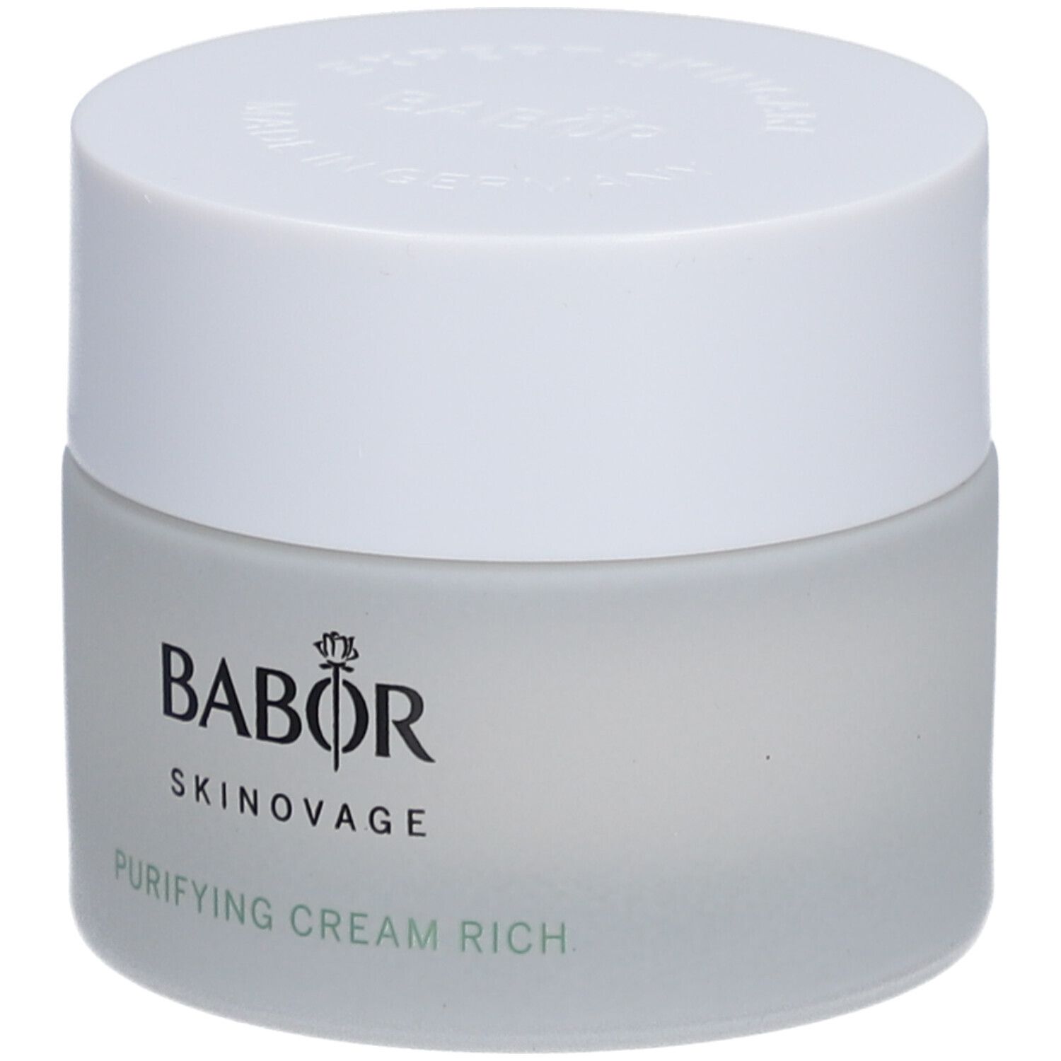 Creme-Tiegel mit weißem Deckel. Auf dem Tiegel steht "BABOR SKINNOVAGE PURIFYING CREAM RICH".
