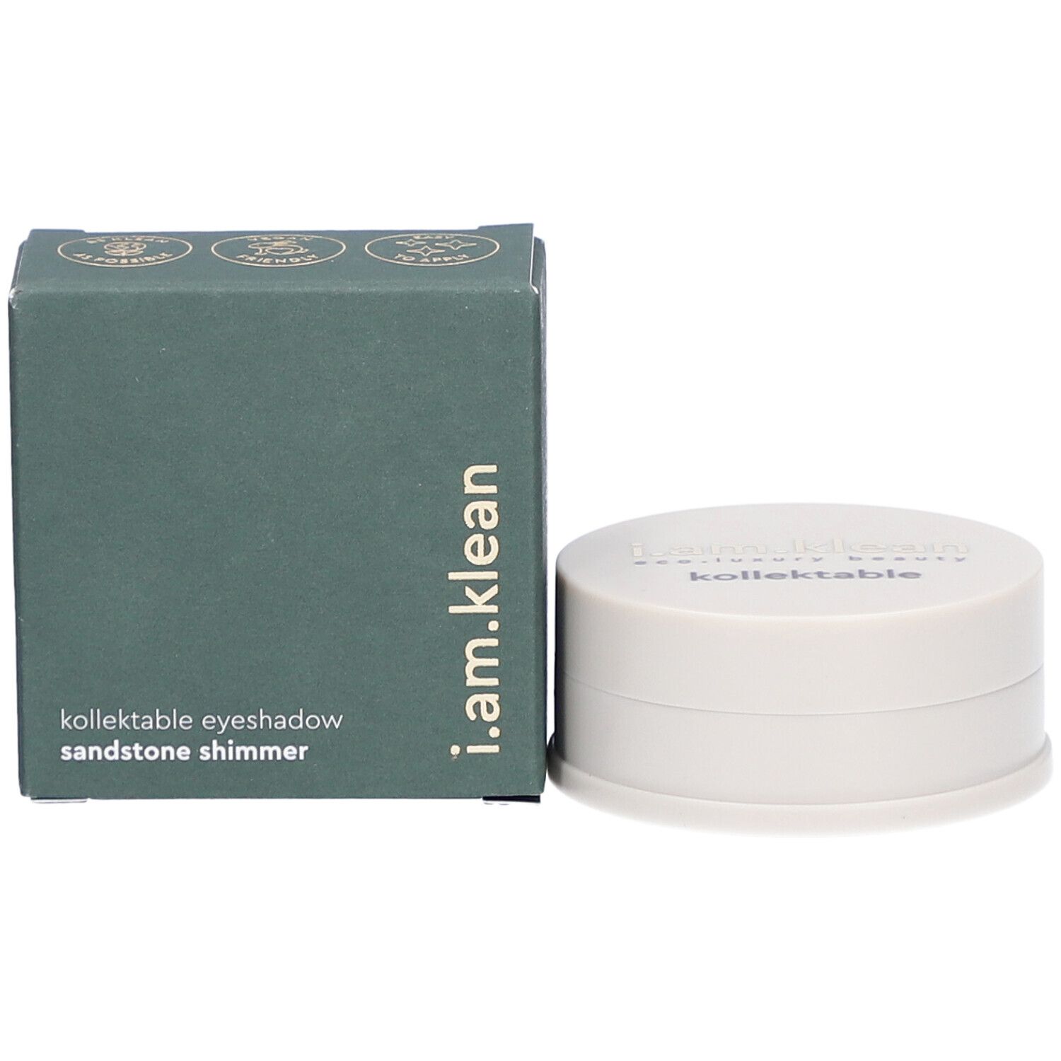 Grüne Schachtel und Dose. Auf der Schachtel steht: i.am.klean, kollektable eyeshadow, sandstone shimmer. Dose daneben.