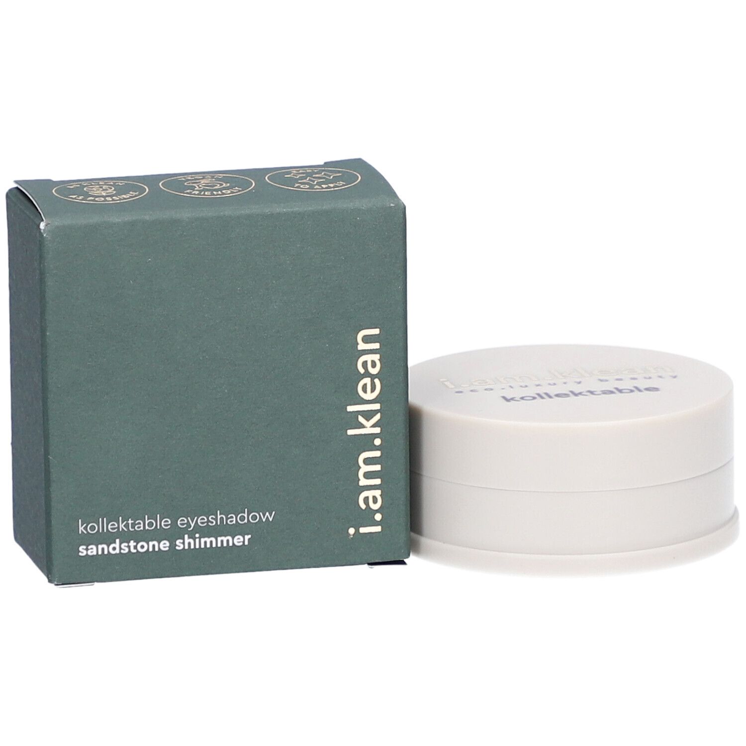 Grüne Schachtel und Dose. Auf der Schachtel steht: i.am.klean, kollektable eyeshadow, sandstone shimmer. Dose daneben.