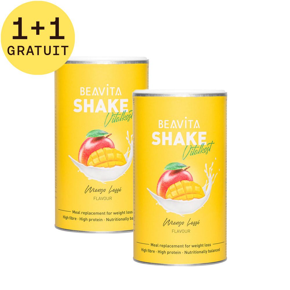 Deux boîtes jaunes BEAVITA Shake Vitality Mango Lassi. Inscription "1+1 GRATUIT". Illustration de mangue et pomme.