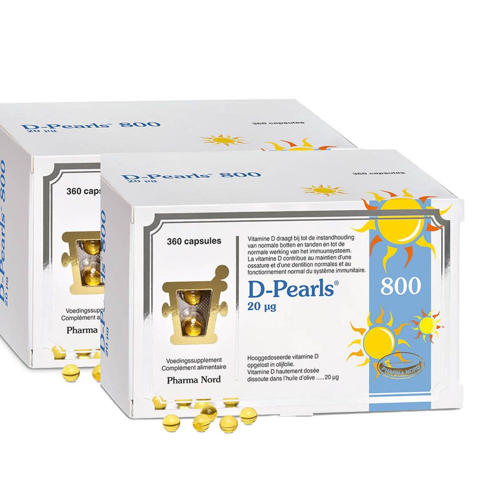 Deux boîtes blanches "D-Pearls 800". Logo Pharma Nord, 360 capsules. Capsules jaunes devant. Illustrations de soleil.