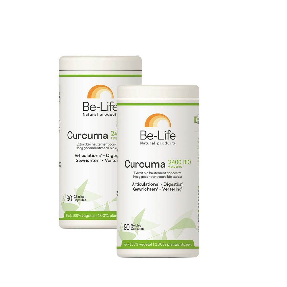 Deux boîtes blanches avec étiquette verte. Inscription: Be-Life Curcuma 2400 BIO. 90 gélules. Logo: soleil.