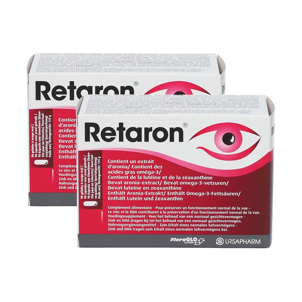 Deux boîtes de Retaron, légèrement en biais. Emballage rouge et blanc avec nom et illustration d'un œil. Texte.
