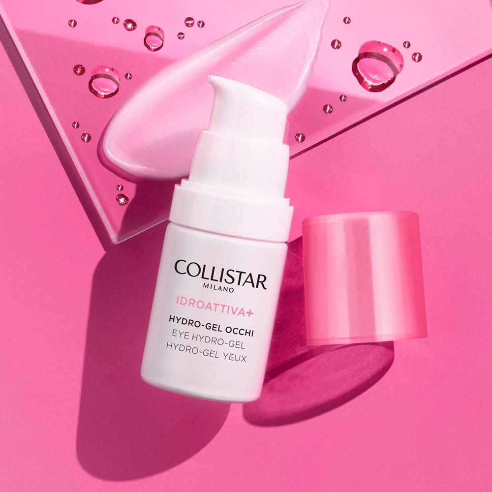 Flacon cylindrique blanc et rose. Inscriptions : COLLISTAR, IDROATTIVA+, HYDRO-GEL OCCHI, EYE HYDRO-GEL, HYDRO-GEL YEUX.