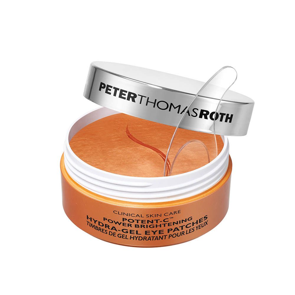 Open pot met oogpatches en spatel. Opschrift: PETER THOMAS ROTH, POTENT-C, Hydra-Gel Eye Patches.