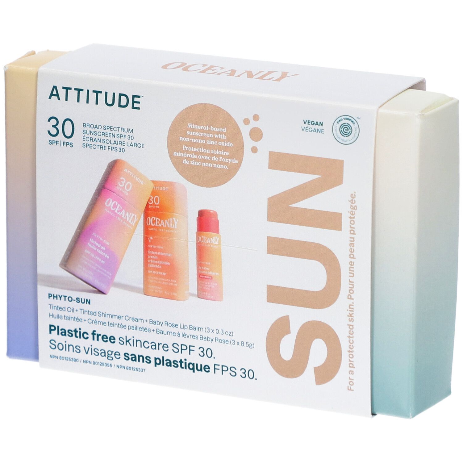 Coffret de soins solaires. Contient huile teintée, crème pailletée et baume à lèvres. SPF 30. Vegan.