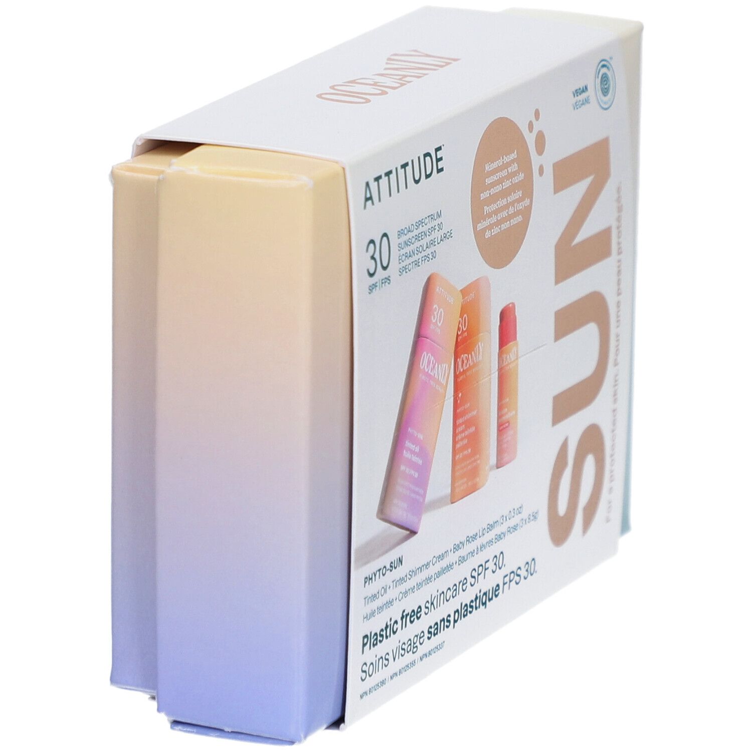 Emballage du coffret de soins solaires. Contient huile teintée, crème pailletée et baume à lèvres. SPF 30. Vegan.