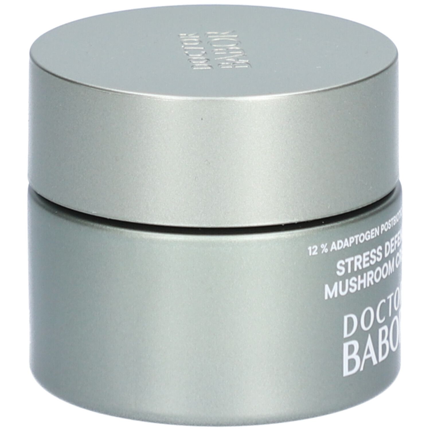 Graue Creme-Dose mit Deckel. Aufschrift: 12% Adaptogen Postbiotic Complex, Stress Defense Mushroom Cream, DOCTOR BABOR.