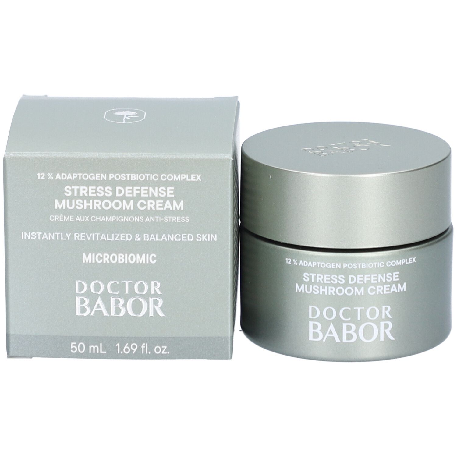 Graue Creme-Dose und Schachtel. Aufschrift: 12% Adaptogen Postbiotic Complex, Stress Defense Mushroom Cream, DOCTOR BABOR.