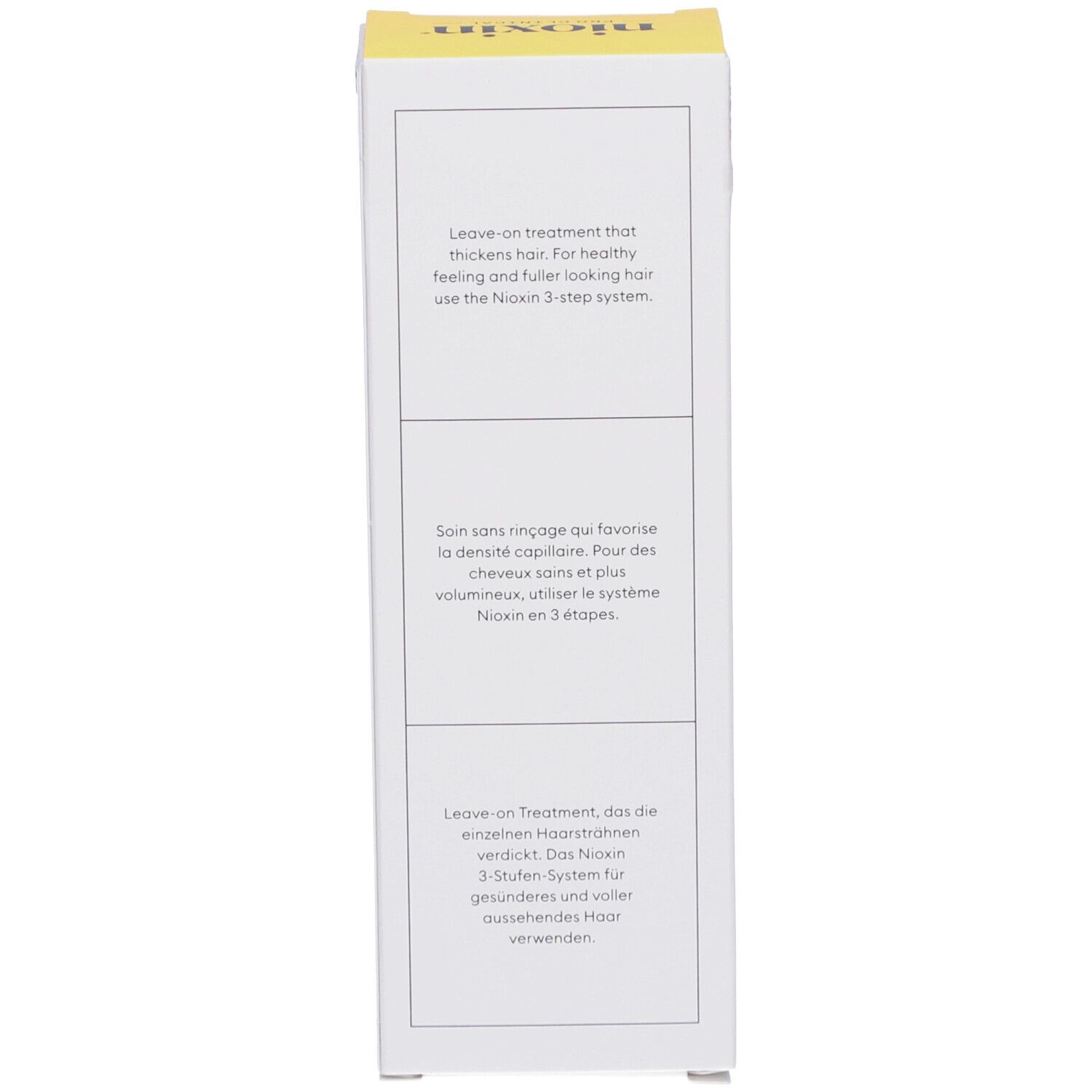 Weiße Box mit gelbem Streifen oben. Text beschreibt Leave-on Treatment für dickeres Haar.