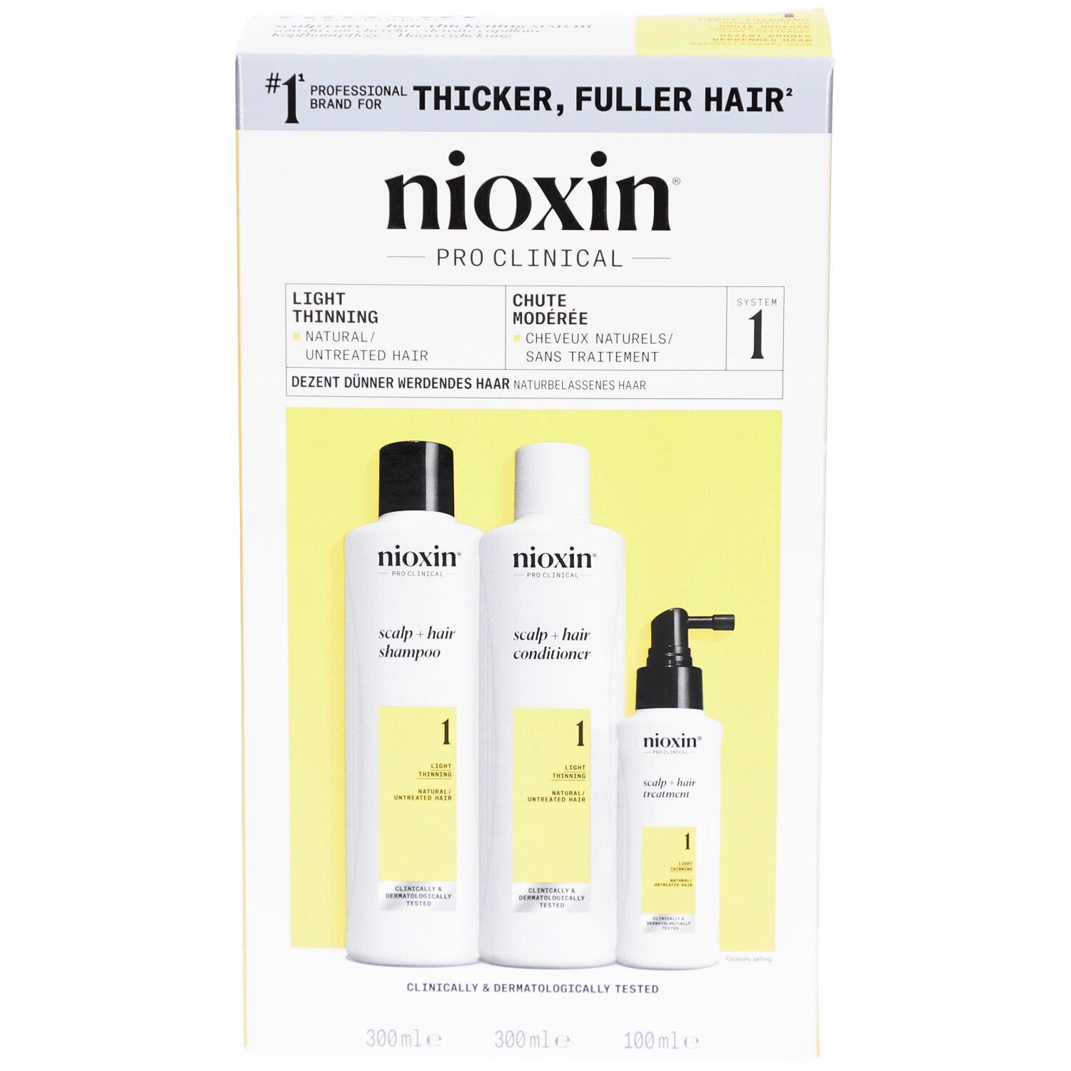 Nioxin-Verpackung mit Shampoo, Conditioner und Treatment. Weiße Flaschen mit gelben Etiketten.