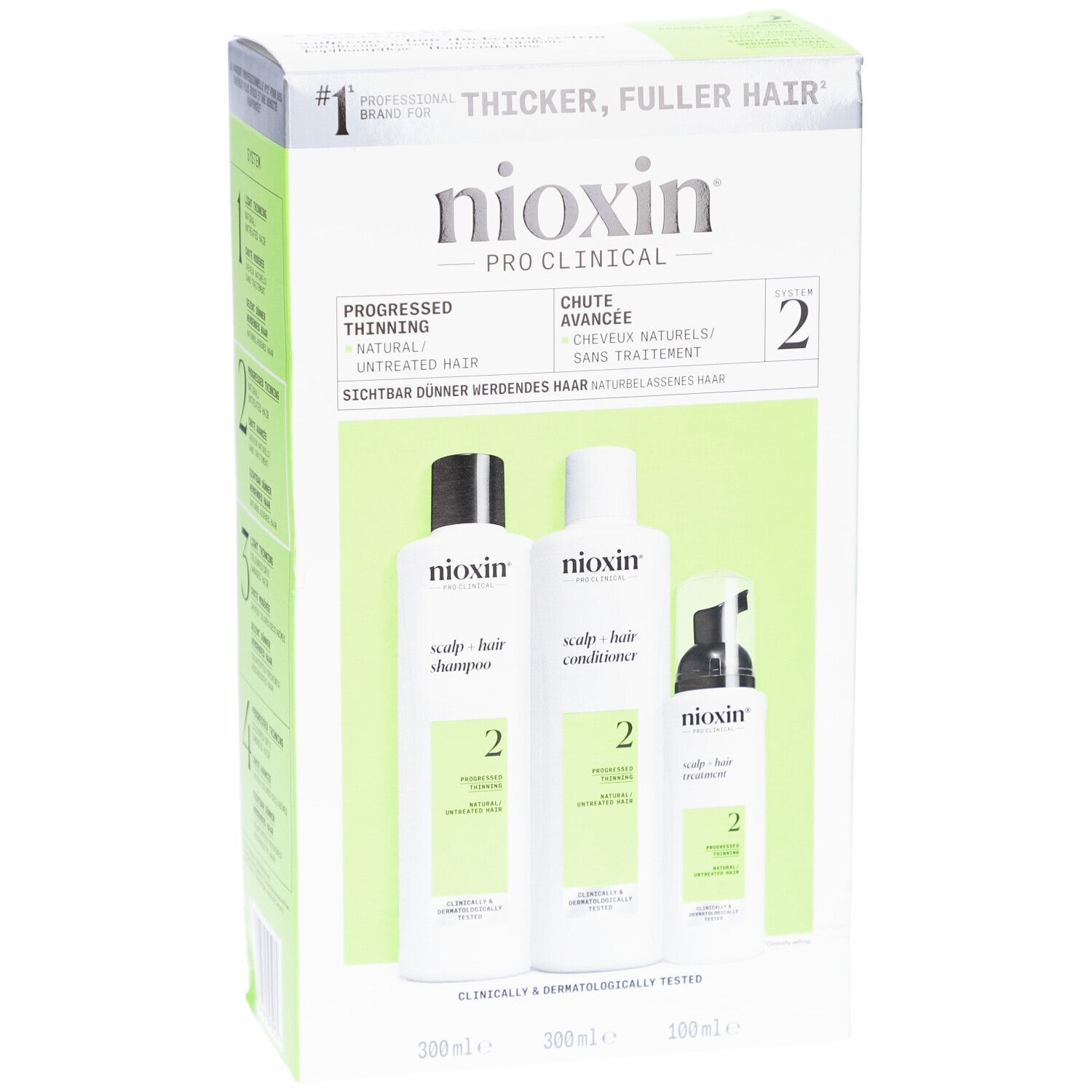 Nioxin System 2 Coffret. Enthält Shampoo, Conditioner und Treatment. Grün-weiße Verpackung mit Produktnamen und Angaben.
