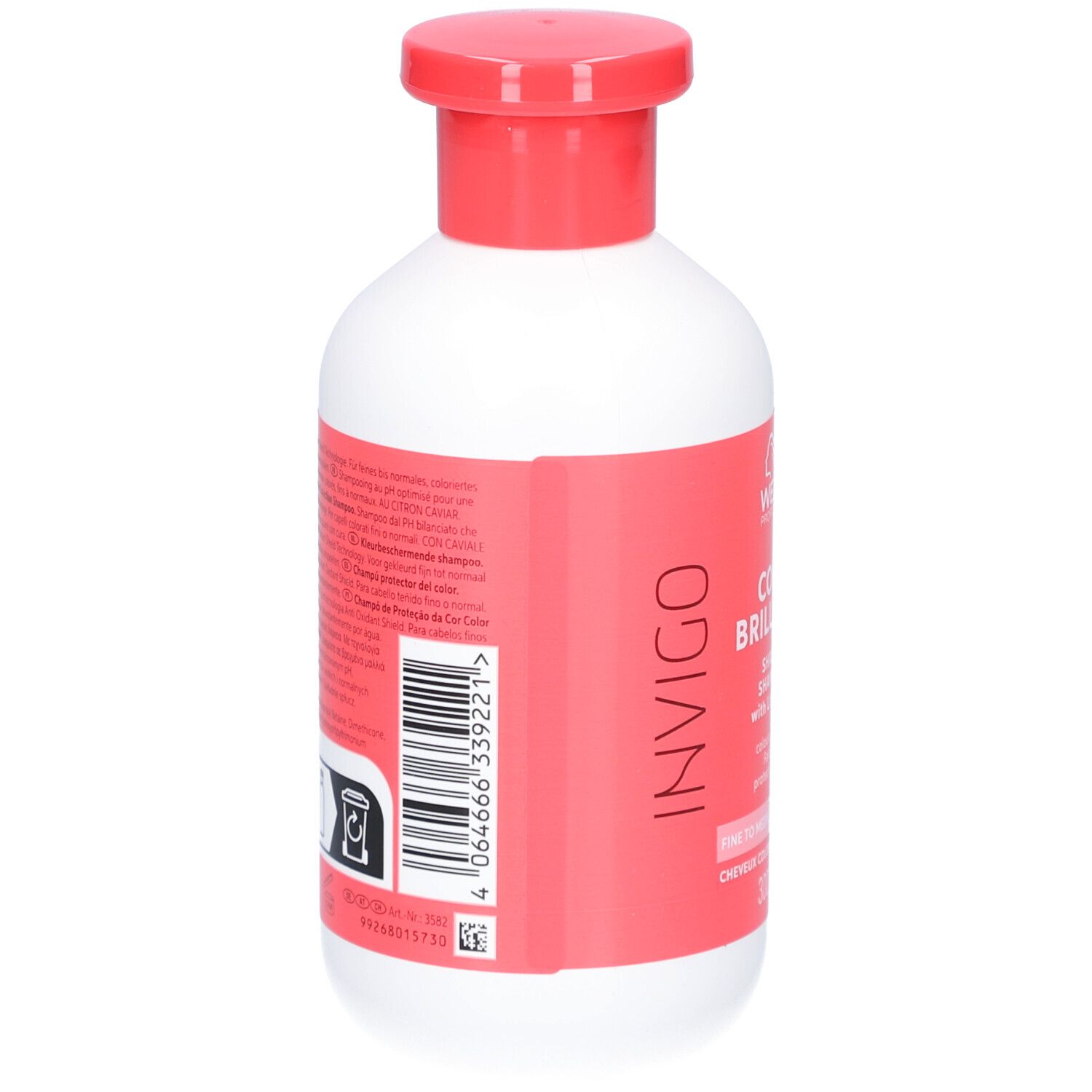 Rückseite der weißen Flasche mit rotem Deckel. Etikett mit Produktinformationen, Barcode und Recycling-Symbolen.
