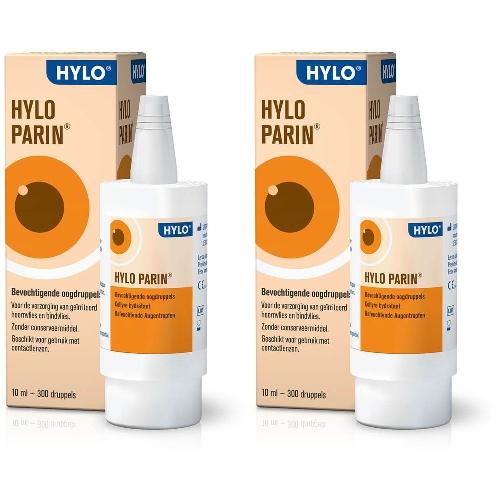 Twee verpakkingen en flacons van Hylo-Parin. Opschrift: Hylo-Parin, bevochtigende oogdruppels. 10 ml - 300 druppels.